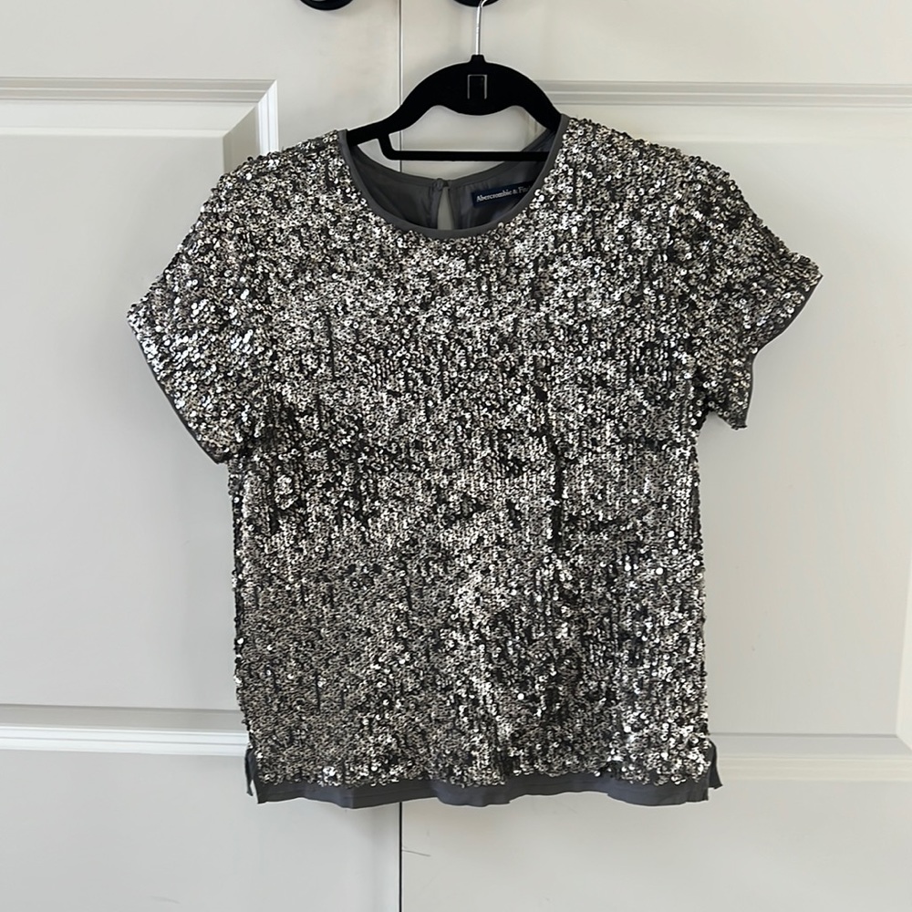 Silver sequin top, excellent condition.